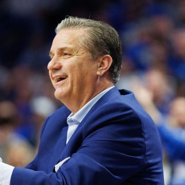 Kentucky Wildcats head coach John Calipari claps during the first half against the Florida Gators at Rupp Arena at Central Bank Center. 