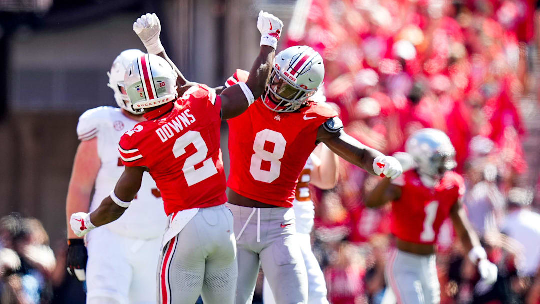 Ohio State Buckeyes safety Caleb Downs (2) and linebacker Arvell Reese (8)