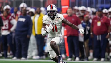 Dec 14, 2024; Atlanta, GA, USA; Jackson State Tigers wide receiver Isaiah Spencer (11) runs after a catch against the South Carolina State Bulldogs in the third quarter at Mercedes-Benz Stadium. Mandatory Credit: Brett Davis-Imagn Images

