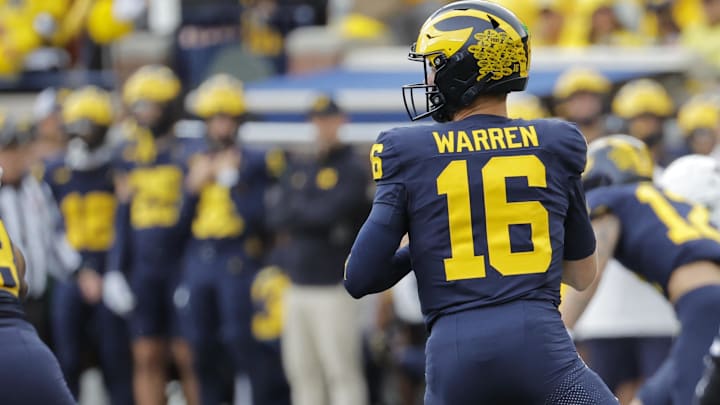 Sep 7, 2024; Ann Arbor, Michigan, USA; Michigan Wolverines quarterback Davis Warren (16) looks to pass in the first half against the Texas Longhorns at Michigan Stadium. Mandatory Credit: Rick Osentoski-Imagn Images