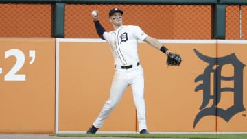 Jul 27, 2024; Detroit, Michigan, USA; Detroit Tigers left fielder Mark Canha (21) throws to the infield during the eighth inning of the game at Comerica Park.