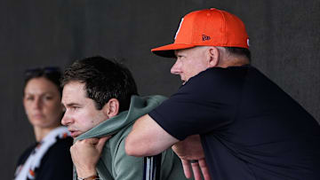Detroit Tigers president of baseball operation Scott Harris, left, and manager A.J. Hinch watch pitching practice during spring training at TigerTown in Lakeland, Fla. on Sunday, Feb. 16, 2025.