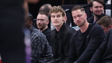 Mar 27, 2025; Salt Lake City, Utah, USA; Utah Jazz forward Lauri Markkanen (center) watches the game from the bench during the second half of the game against the Houston Rockets at Delta Center. Mandatory Credit: Rob Gray-Imagn Images