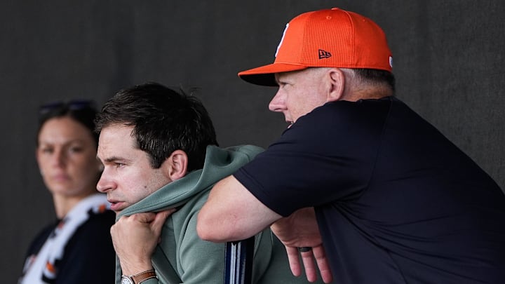 Detroit Tigers president of baseball operation Scott Harris, left, and manager A.J. Hinch watch pitching practice during spring training at TigerTown in Lakeland, Fla. on Sunday, Feb. 16, 2025.