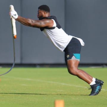 Jacksonville Jaguars linebacker Josh Hines-Allen (41) works out with a sled during the fourth day of the NFL football training camp practice session Saturday, July 27, 2024 at EverBank Stadium's Miller Electric Center in Jacksonville, Fla.. [Bob Self/Florida Times-Union]