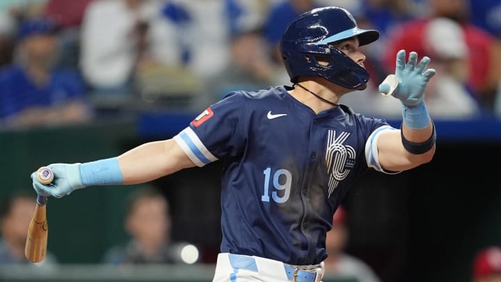 Aug 9, 2024; Kansas City, Missouri, USA; Kansas City Royals second baseman Michael Massey (19) hits an RBI single during the fourth inning against the St. Louis Cardinals at Kauffman Stadium. Mandatory Credit: Jay Biggerstaff-USA TODAY Sports