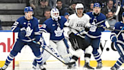 Nov 13, 2025; Toronto, Ontario, CAN;  Los Angeles Kings forward Quintin Byfield (55) screens Toronto Maple Leafs goalie Dennis Hildeby (35) as defensemen Jake McCabe (22) and Simon Benoit (2) track the play in the third period at Scotiabank Arena. Mandatory Credit: Dan Hamilton-Imagn Images