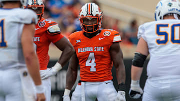 Aug 31, 2024; Stillwater, Oklahoma, USA; Oklahoma State Cowboys linebacker Nick Martin (4) ready for a play during the fourth quarter against the South Dakota State Jackrabbits at Boone Pickens Stadium. Mandatory Credit: William Purnell-Imagn Images