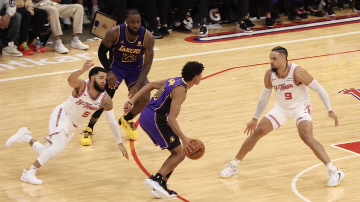 Nov 8, 2023; Houston, Texas, USA; Los Angeles Lakers forward LeBron James (23) picks Houston Rockets guard Fred VanVleet (5) as Los Angeles Lakers guard Max Christie (10) dribbles against Houston Rockets forward Dillon Brooks (9) in the second quarter at Toyota Center. Mandatory Credit: Thomas Shea-USA TODAY Sports