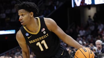 Mar 21, 2025; Cleveland, OH, USA; Vanderbilt Commodores guard AJ Hoggard (11) dribbles in the second half against the St. Mary's Gaels at Rocket Arena. Mandatory Credit: Rick Osentoski-Imagn Images