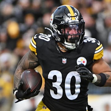 Nov 16, 2025; Pittsburgh, Pennsylvania, USA; Pittsburgh Steelers running back Jaylen Warren (30) runs with the ball against the Cincinnati Bengals during the first half at Acrisure Stadium. Mandatory Credit: Barry Reeger-Imagn Images