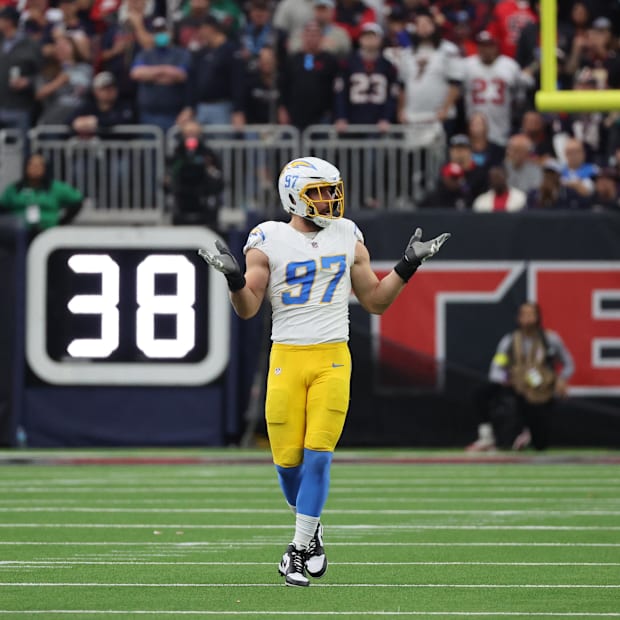 Joey Bosa (97) responds