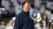 Sep 28, 2024; University Park, Pennsylvania, USA; Illinois Fighting Illini head coach Bret Bielema stands on the field during a warmup prior to a game against the Penn State Nittany Lions at Beaver Stadium. Mandatory Credit: Matthew O'Haren-Imagn Images