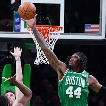 Apr 5, 2023; Boston, Massachusetts, USA; Boston Celtics center Robert Williams III (44) blocks the shot of Toronto Raptors forward Precious Achiuwa (5) in the second half at TD Garden. Mandatory Credit: David Butler II-Imagn Images