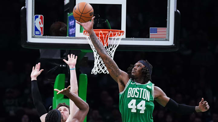 Apr 5, 2023; Boston, Massachusetts, USA; Boston Celtics center Robert Williams III (44) blocks the shot of Toronto Raptors forward Precious Achiuwa (5) in the second half at TD Garden. Mandatory Credit: David Butler II-Imagn Images