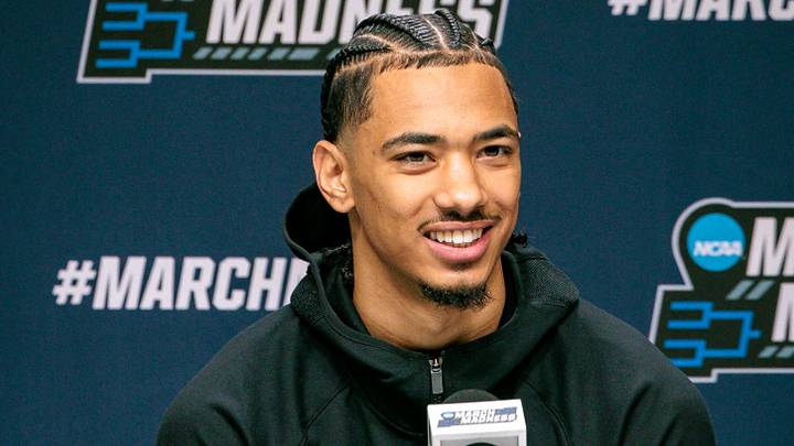 Mar 18, 2026; Oklahoma City, OK, USA; Houston Cougars and now Boston Celtics guard Milos Uzan (7) answers questions during a press conference prior to the practice session ahead of the first round of the men's 2026 NCAA Tournament at Paycom Center. Mandatory Credit: William Purnell-Imagn Images