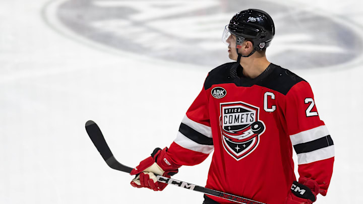 Utica Comets forward Ryan Schmelzer gets ready for the opening face-off at the Adirondack Bank Center on Friday, March 22, 2024.