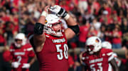 Louisville’s Pete Nygra is pumped up after they score a touchdown against Virginia at L&N Stadium Saturday.
Ocr. 4, 2025