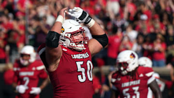 Louisville’s Pete Nygra is pumped up after they score a touchdown against Virginia at L&N Stadium Saturday.
Ocr. 4, 2025