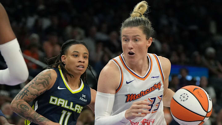 Jul 7, 2025; Phoenix, Arizona, USA; Phoenix Mercury guard Sami Whitcomb (33) drives past Dallas Wings guard JJ Quinerly (11) in the second half at Footprint Center. Mandatory Credit: Rick Scuteri-Imagn Images Jul 7, 2025; Phoenix, Arizona, USA; Phoenix Mercury guard Sami Whitcomb (33) drives past Dallas Wings guard JJ Quinerly (11) in the second half at Footprint Center. Mandatory Credit: Rick Scuteri-Imagn Images