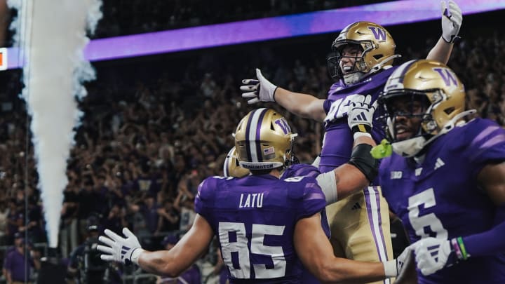 Decker DeGraaf celebrates his 33-yard touchdown catch with his Husky teammates. 