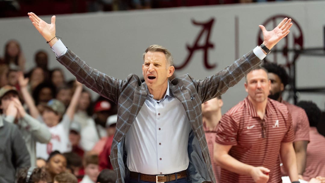 Feb 18, 2026; Tuscaloosa, AL, USA; Alabama head coach Nate Oats yells about a call he disagreed with during the game with Arkansas at Coleman Coliseum. Alabama defeated Arkansas 117-115 in double overtime. Mandatory Credit: Gary Cosby Jr.-Tuscaloosa News