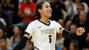 Purdue Boilermakers Taylor Anderson (5) smiles after a point 