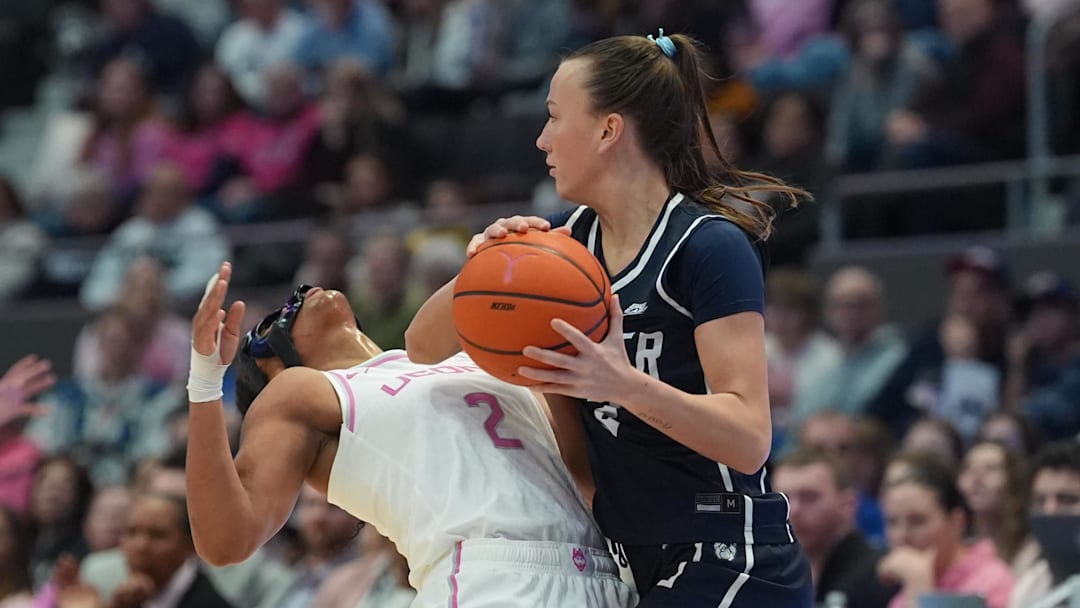 Feb 7, 2026; Hartford, Connecticut, USA; Butler Bulldogs guard Anna Wypych (2) called for the foul against UConn Huskies guard Kk Arnold (2) in the first half at PeoplesBank Arena. Mandatory Credit: David Butler II-Imagn Images