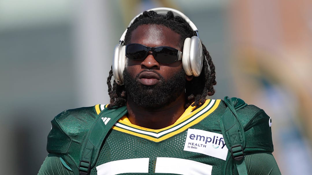 Green Bay Packers defensive lineman Brenton Cox Jr. (57) participates in the Dream Drive bicycle ride during the sixth day of training camp on July 29, 2025, in Green Bay, Wis.