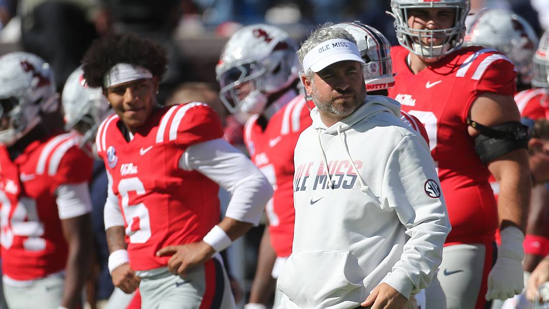 Mississippi Rebels head coach Pete Golding and quarterback Trinidad Chambliss. Mandatory Credit: Petre Thomas-Imagn Images