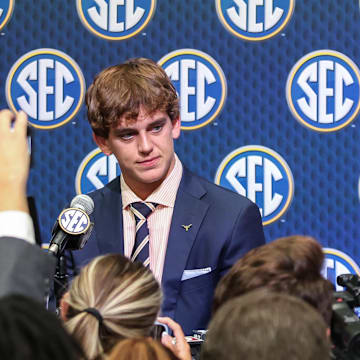 Jul 15, 2025; Atlanta, GA, USA; Texas Longhorns quarterback Arch Manning answers questions from the media during SEC Media Days at Omni Atlanta Hotel. Mandatory Credit: Jordan Godfree-Imagn Images
