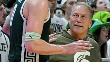 Nov 13, 2025; East Lansing, Michigan, USA;  Michigan State Spartans forward Jaxon Kohler (0) draws a smile from Michigan State Spartans head coach Tom Izzo during the second half as they defeat the San Jose State Spartans at Jack Breslin Student Events Center. Mandatory Credit: Dale Young-Imagn Images