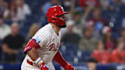 Sep 24, 2025; Philadelphia, Pennsylvania, USA; Philadelphia Phillies outfielder Kyle Schwarber (12) hits a double during the first inning against the Miami Marlins at Citizens Bank Park. Mandatory Credit: Bill Streicher-Imagn Images