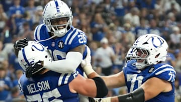 Indianapolis Colts players celebrate Indianapolis Colts running back Ameer Abdullah (26) after Abdullah scores a touchdown Sunday, Oct. 5, 2025, during a game at Lucas Oil Stadium in Indianapolis. The Colts defeated the Raiders 40-6.