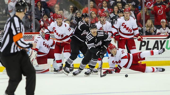 Jan 1, 2023; Newark, New Jersey, USA; New Jersey Devils defenseman Dougie Hamilton (7) skates out of the pack against the Carolina Hurricanes during the third period at Prudential Center. Mandatory Credit: Thomas Salus-Imagn Images