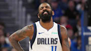 Dec 15, 2024; San Francisco, California, USA; Dallas Mavericks guard Kyrie Irving (11) reacts after suffering an injury during the fourth quarter against the Golden State Warriors at Chase Center. Mandatory Credit: Darren Yamashita-Imagn Images