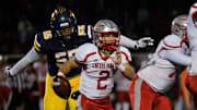 Streetsboro defensive lineman Arthur Scott III closes in on Northwest quarterback Chase Badger during a second-round playoff game Friday, Nov. 8, 2024.