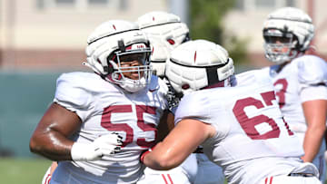The Crimson Tide players and coaches continue working toward the season opener in practice Tuesday, Aug. 13, 2024. Alabama offensive lineman Roq Montgomery (55) blocks Alabama offensive lineman Wade Estess (67).