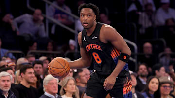 Nov 14, 2025; New York, New York, USA; New York Knicks forward OG Anunoby (8) brings the ball up court against the Miami Heat during the first quarter at Madison Square Garden. Mandatory Credit: Brad Penner-Imagn Images
