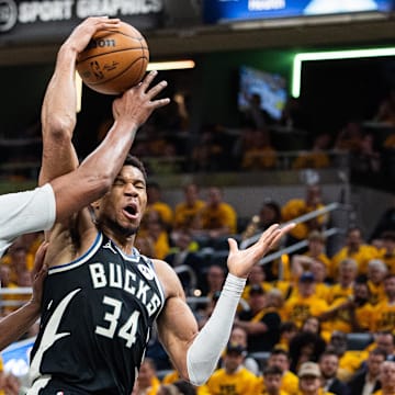 Apr 29, 2025; Indianapolis, Indiana, USA; Milwaukee Bucks forward Giannis Antetokounmpo (34) shoots the ball while Indiana Pacers center Myles Turner (33) defends during game five of the first round for the 2024 NBA Playoffs at Gainbridge Fieldhouse. Mandatory Credit: Trevor Ruszkowski-Imagn Images