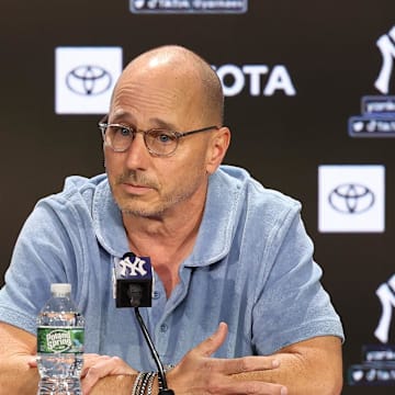 Aug 23, 2023; Bronx, New York, USA; New York Yankees general manager Brian Cashman talks with the media before the game between the Yankees and the Washington Nationals at Yankee Stadium. Mandatory Credit: Vincent Carchietta-Imagn Images