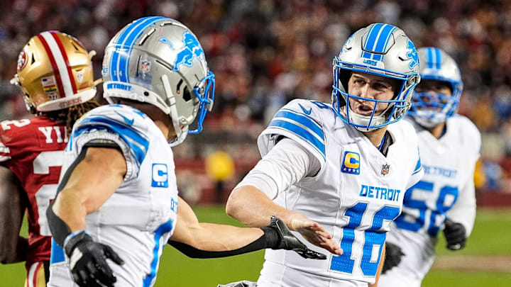 Detroit Lions quarterback Jared Goff (16) shakes hands with wide receiver Amon-Ra St. Brown (14), left, after scoring a touchdown against San Francisco 49ers during the second half at Levi's Stadium in Santa Clara, Calif. on Monday, Dec. 30, 2024. Detroit Lions quarterback Jared Goff (16) shakes hands with wide receiver Amon-Ra St. Brown (14), left, after scoring a touchdown against San Francisco 49ers during the second half at Levi's Stadium in Santa Clara, Calif. on Monday, Dec. 30, 2024.