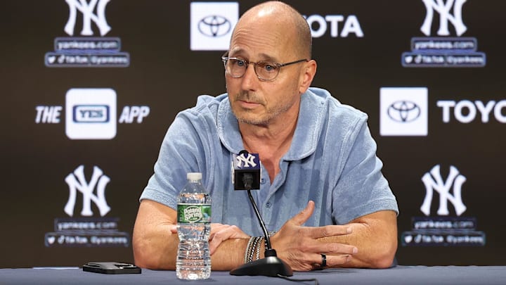 Aug 23, 2023; Bronx, New York, USA; New York Yankees general manager Brian Cashman talks with the media before the game between the Yankees and the Washington Nationals at Yankee Stadium. Mandatory Credit: Vincent Carchietta-Imagn Images