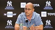 Aug 23, 2023; Bronx, New York, USA; New York Yankees general manager Brian Cashman talks with the media before the game between the Yankees and the Washington Nationals at Yankee Stadium. Mandatory Credit: Vincent Carchietta-Imagn Images