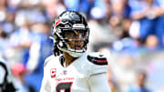 Sep 8, 2024; Indianapolis, Indiana, USA;  Houston Texans quarterback C.J. Stroud (7) looks for a teammate during the first quarter against the Indianapolis Colts at Lucas Oil Stadium. Mandatory Credit: Marc Lebryk-Imagn Images