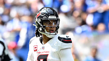 Sep 8, 2024; Indianapolis, Indiana, USA;  Houston Texans quarterback C.J. Stroud (7) looks for a teammate during the first quarter against the Indianapolis Colts at Lucas Oil Stadium. Mandatory Credit: Marc Lebryk-Imagn Images