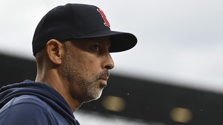 May 29, 2024; Baltimore, Maryland, USA; Boston Red Sox manager Alex Cora (13) looks onto the field during the second inning against the Baltimore Orioles  at Oriole Park at Camden Yards. Mandatory Credit: Tommy Gilligan-USA TODAY Sports