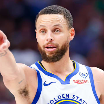 Apr 5, 2024; Dallas, Texas, USA;  Golden State Warriors guard Stephen Curry (30) reacts in front of Dallas Mavericks forward Derrick Jones Jr. (55) during the second half at American Airlines Center. 