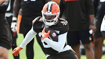 Jun 10, 2025; Berea, OH, USA; Cleveland Browns running back Dylan Sampson (22) runs with the ball during minicamp at CrossCountry Mortgage Campus. Mandatory Credit: Ken Blaze-Imagn Images