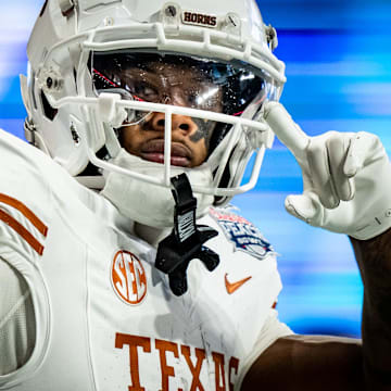 Texas Longhorns wide receiver Matthew Golden (2) celebrates catching a long pass for a first down near the end zone in the fourth quarter as the Texas Longhorns play the Arizona State Sun Devils in the Peach Bowl College Football Playoff quarterfinal at Mercedes-Benz Stadium in Atlanta, Georgia, Jan. 1, 2025.